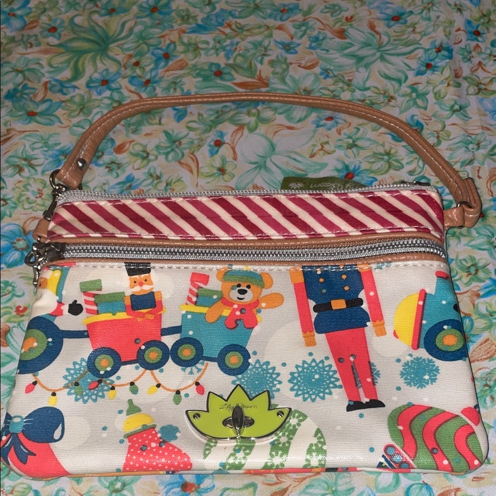 Colorful lily bloom Holiday Themed wristlet